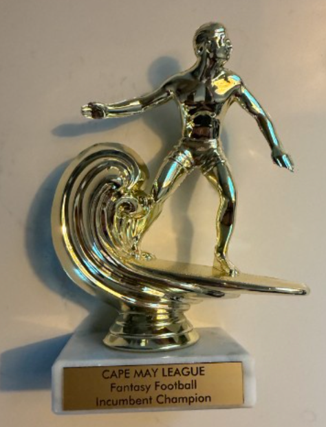 Cape May League championship trophy, a gold surfer on a marble base